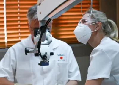 Dentist performing a procedure on a patient at Dr. Ivan Marx Dental practice in Pretoria